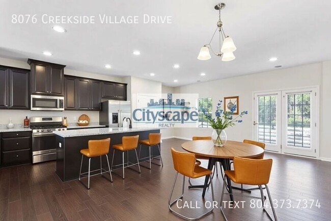 Building Photo - 8076 Creekside Village Dr