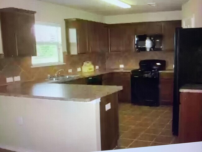Foto del edificio - 7421 Cedar Edge Dr