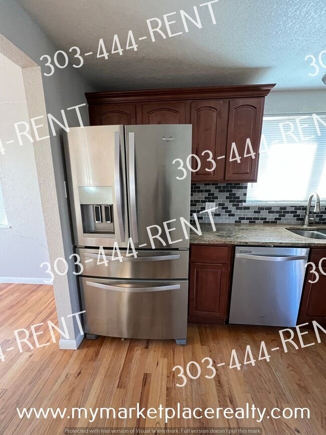 Building Photo - 5 Bedrooms & 2 Bathrooms walking distance to the Sheridan Light Rail Station!