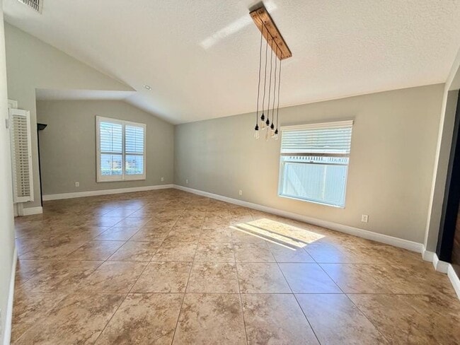 Building Photo - Modern Living Meets Prime Location with this Stunning 4/2!