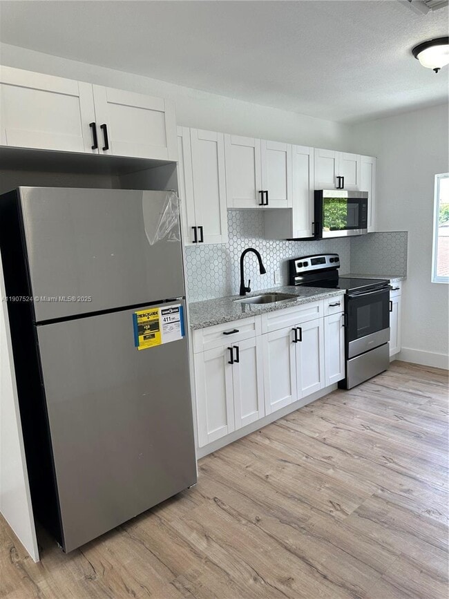 Foto del edificio - 3123 NW 22nd Ct