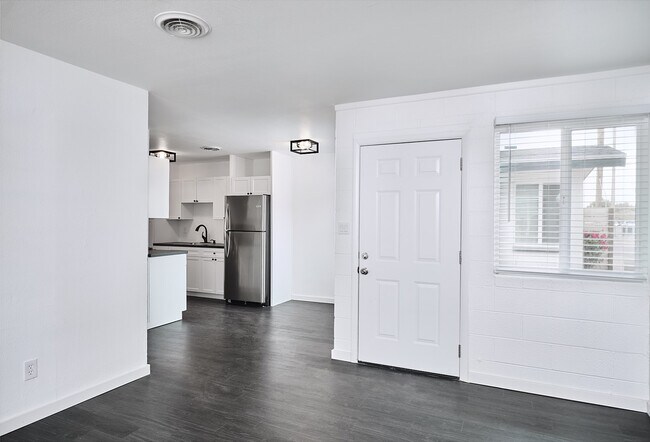Living Room and Dining Room - 4033 E Belleview St