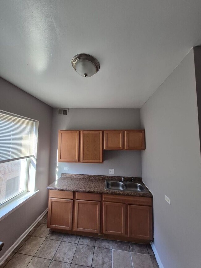 Foto del edificio - 5038 W Washington Blvd