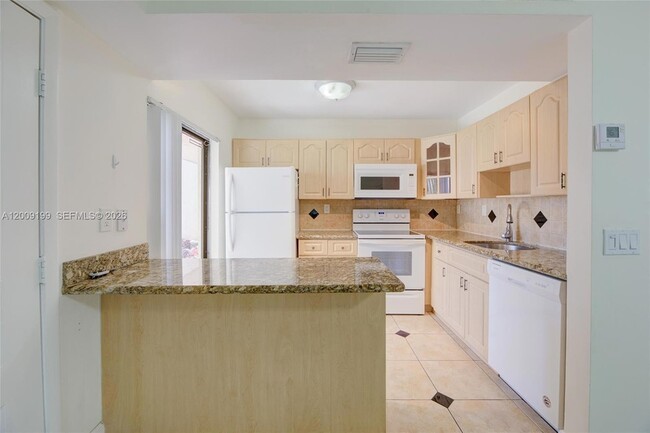 Building Photo - 20160 NE 3rd Ct