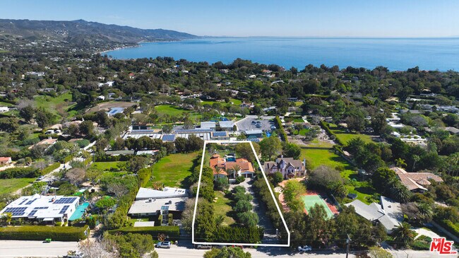 Foto del edificio - 6934 Grasswood Ave