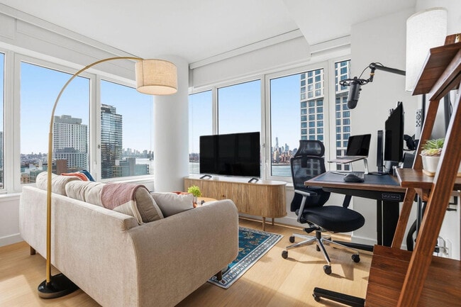 Building Photo - 4-75-75 48th Ave