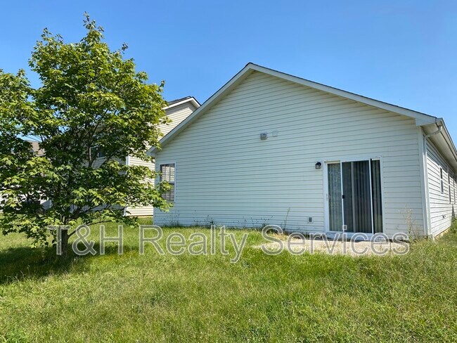 Foto del edificio - 5658 Sweet River Dr
