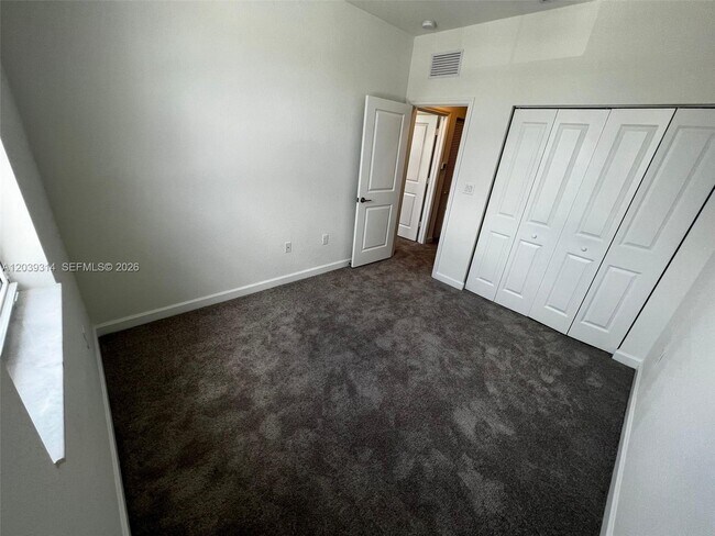 Building Photo - 1180 SE 26 TERR