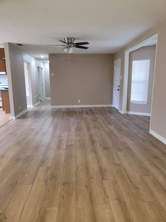 Building Photo - Four Bedroom Ranch with New Flooring