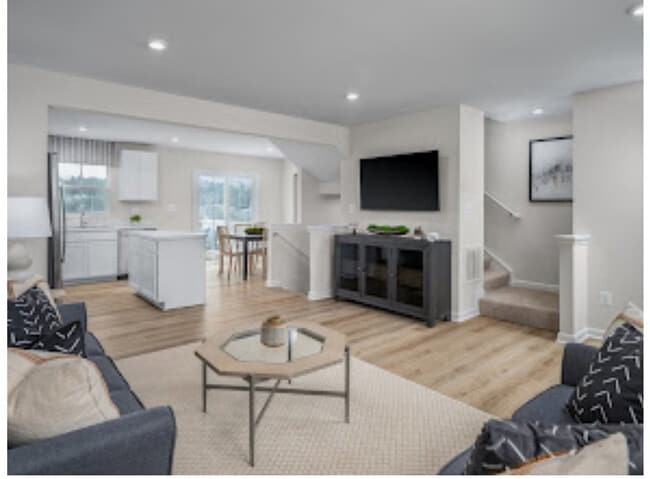 Open kitchen dining living area sliding door to deck looking out into nature 1.2bathe - 13 Limestone Blvd