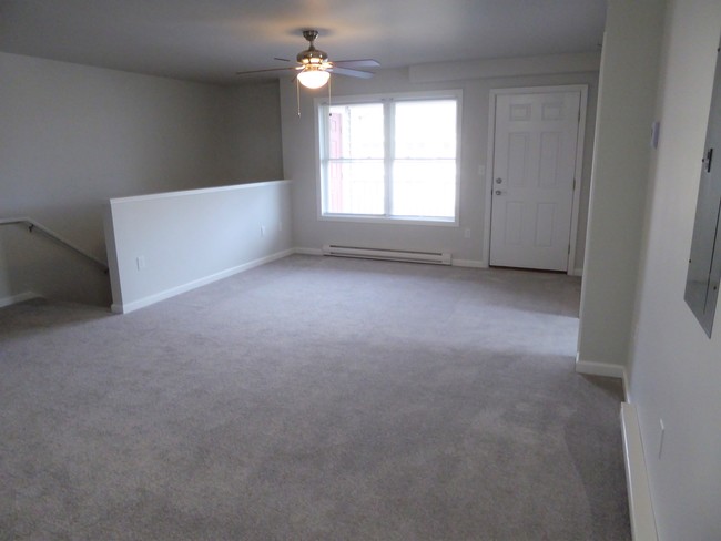 1 Bedroom Garden Style Second Floor- Living Room - Enclave Estates