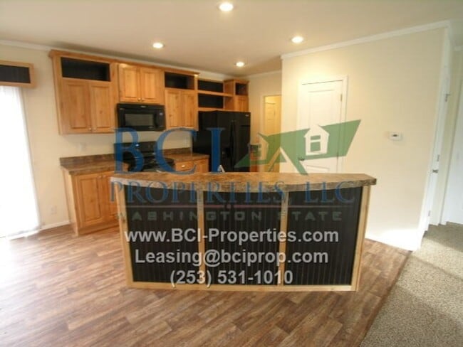 Building Photo - Welcome Home to Evergreen Place Condominiu...