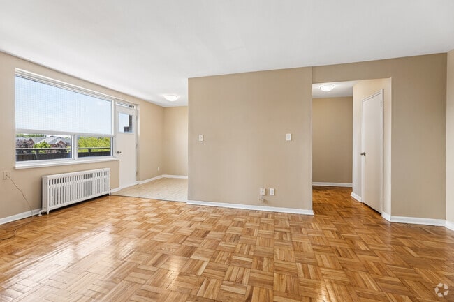 3BR, 1BA - 788SF - Living Room - Trudelle Court Apartments