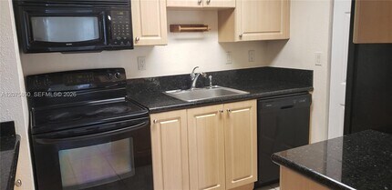Building Photo - 10785 SW 108th Ave