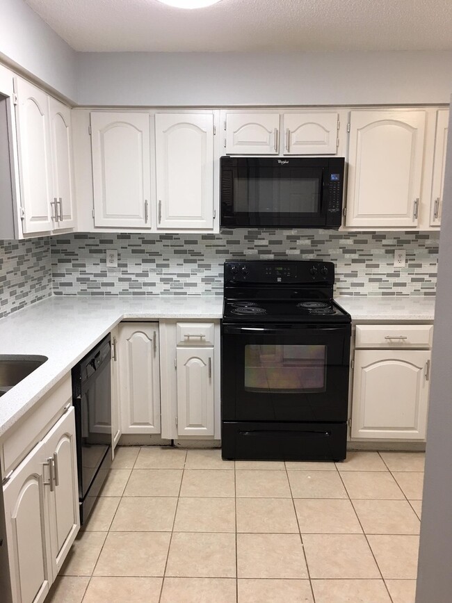 Building Photo - Upgraded 2BR/2.5BA Townhome for Rent – $1,...