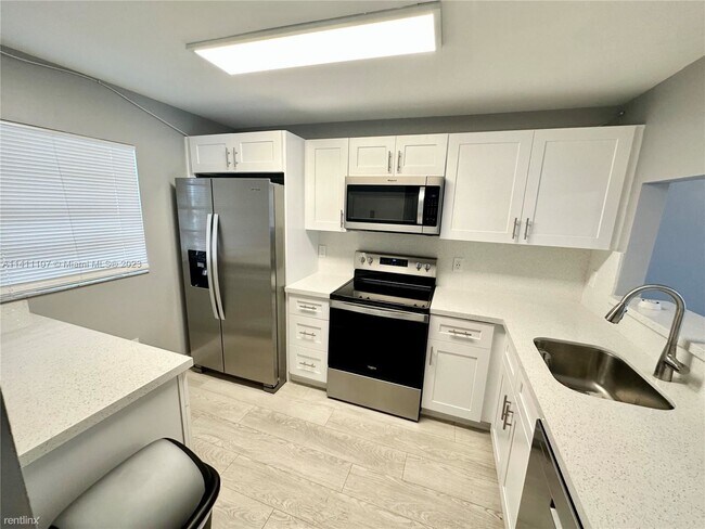Foto del edificio - 2 br, 2 bath Condo - 7801 Abbott Ave Apt 405