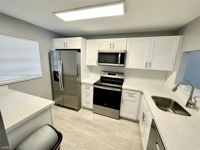 Building Photo - 2 br, 2 bath Condo - 7801 Abbott Ave Apt 405