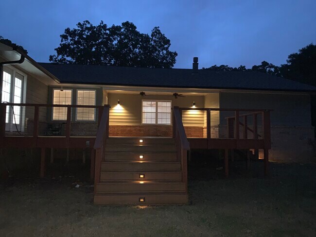 5 ft wide stairs from large patio deck to back lawn - 9717 Thistle Ct