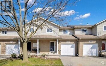 Building Photo - 1408 Mickaila Cres