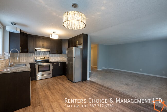 Building Photo - 2 Bedroom Basement Suite, Assigned Parking...
