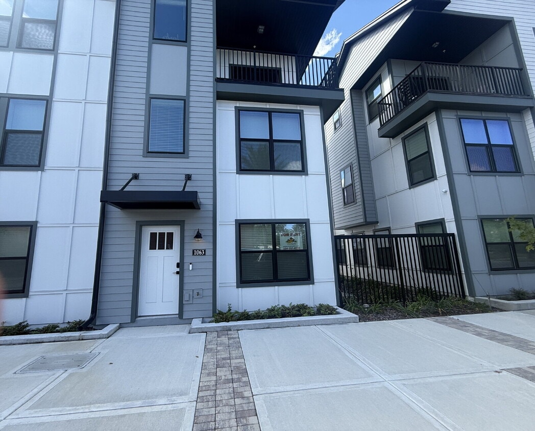 Primary Photo - Modern 2-Bedroom Townhome with Garage Park...