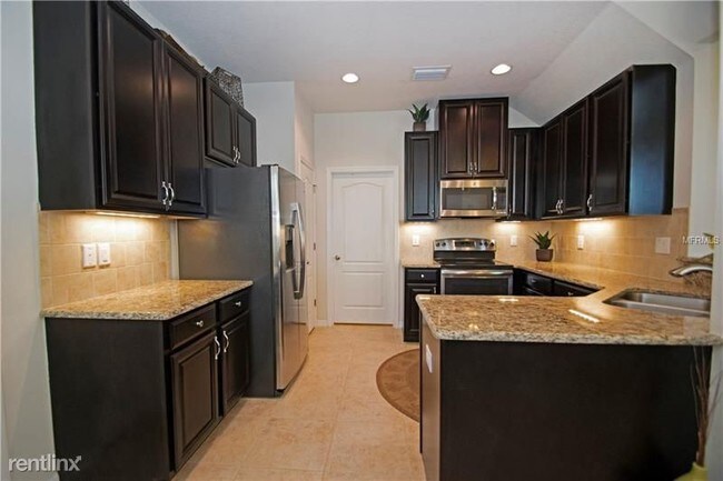Foto del edificio - 3 br, 2.5 bath Townhome - 5142 Bay Isle Cir
