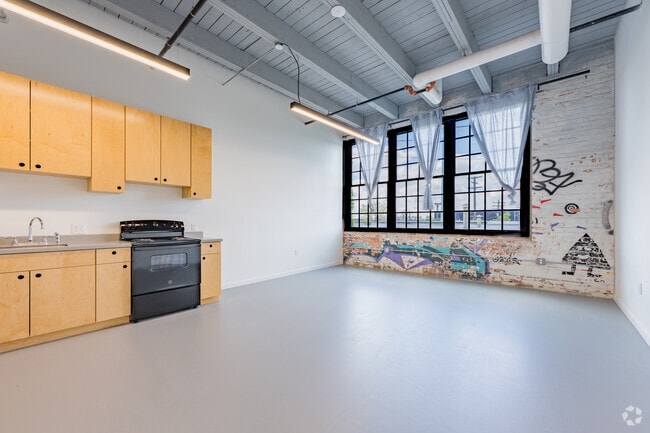 1BR, 1BA - 704SF - Living Room - DREAMTROIT