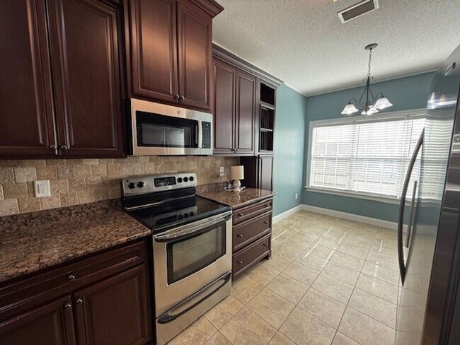 Building Photo - 5026 Greyfield Pl N