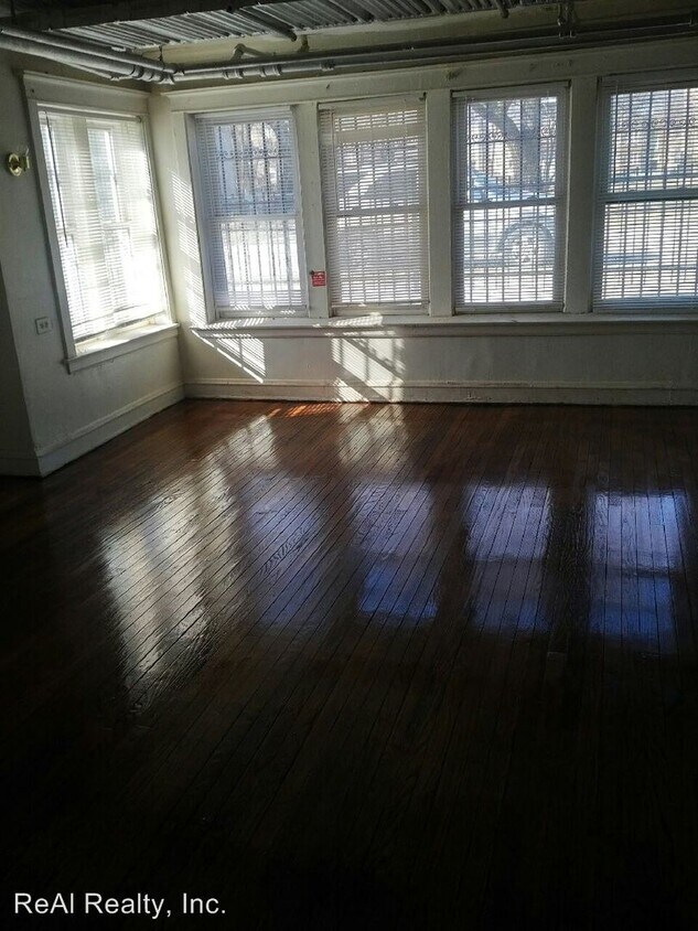 Building Photo - 6415-6417 S Champlain Ave