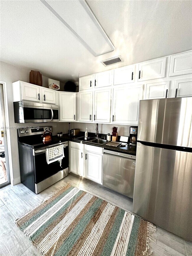 Foto del edificio - 397 NW 48th Ct