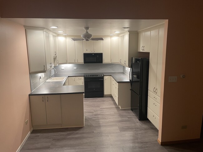 Remodeled to expand counter and storage areas - 9300 E Center Ave