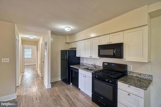 Foto del edificio - 2 br, 1 bath House - 5227 Marlboro Pike Ap...
