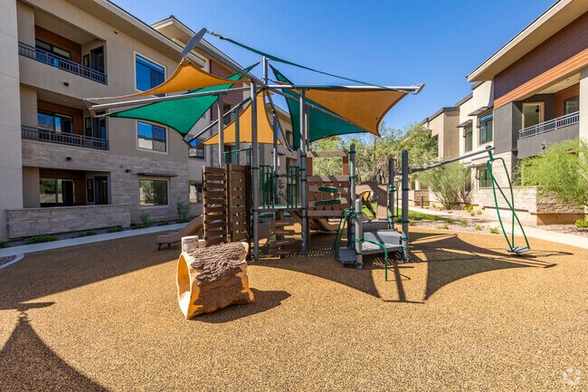 Patio de juegos - Elysium Apartments