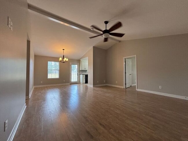 Building Photo - You will LOVE the fenced yard!