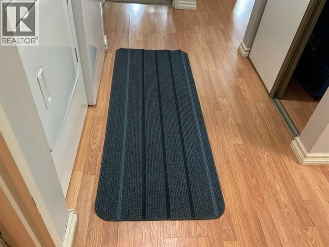 Building Photo - 3002-3056 56 Ave