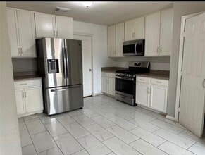 Building Photo - 17002 Westminster Village Ct