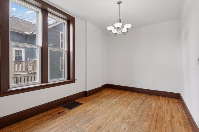 Airy and Bright Living Room w/ New Windows - 698 Wilson Ave