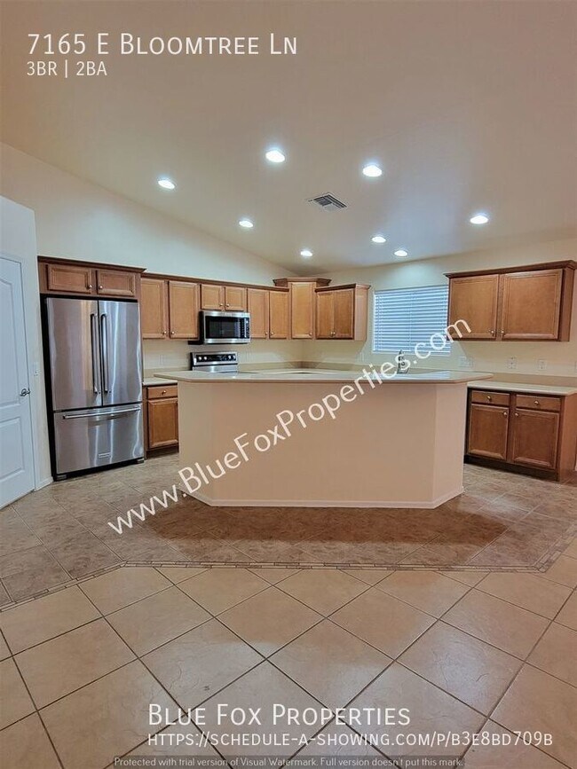 Building Photo - 7165 E. Bloomtree Ln
