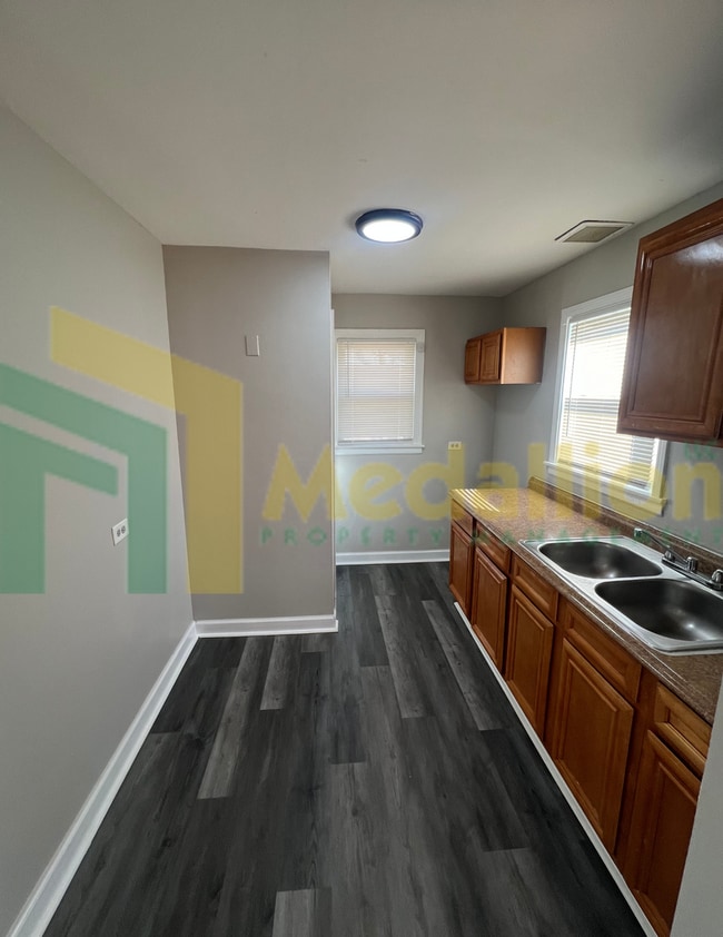 Building Photo - Spacious 5-Bedroom, 2-Bath Corner Lot Home...