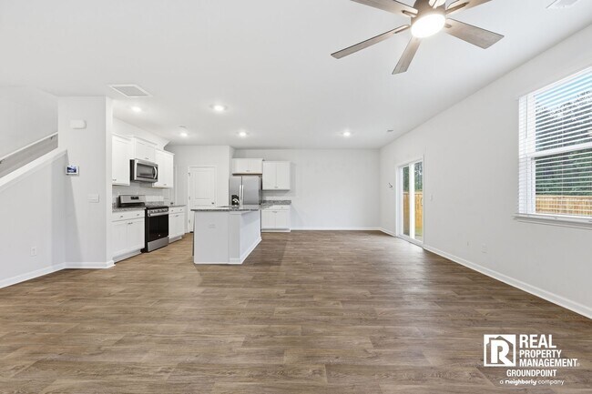 Building Photo - 4 Bedroom Rental in Cane Bay Plantation with Open Layout and Pond View