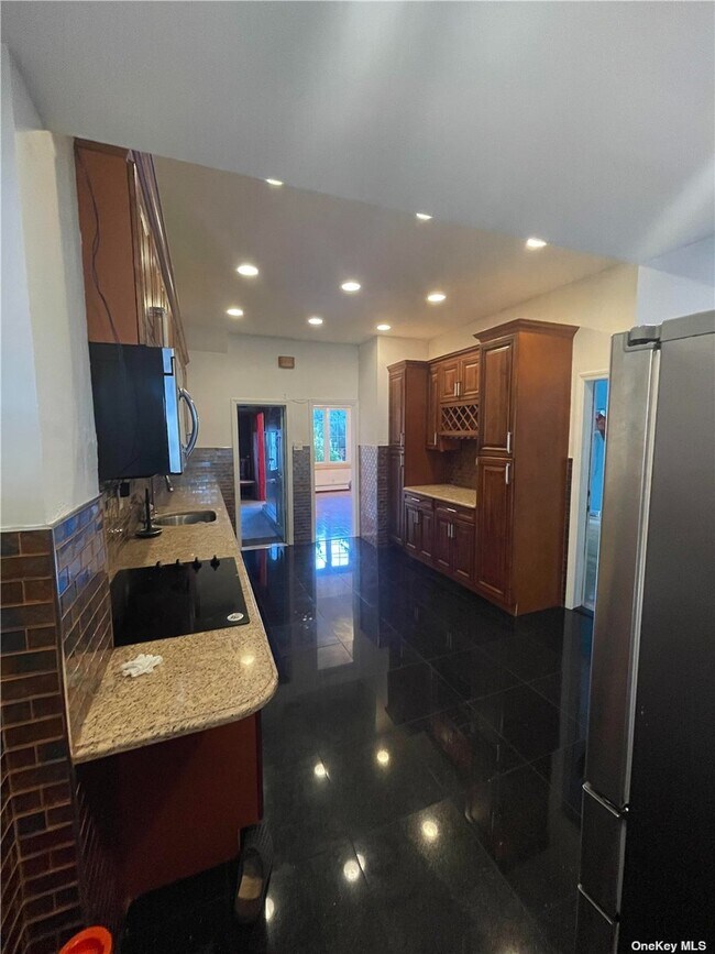 Foto del edificio - 107-42 128th St