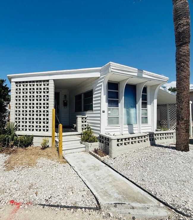Building Photo - Beautiful fully furnished one bedroom, one bath manufactured home in a 55+ deed restricted gated ...