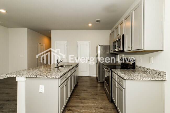 Foto del edificio - 104 Vlg Grn Dr NW