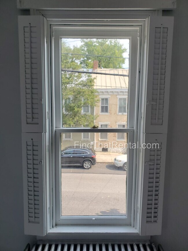 Foto del edificio - Charming Historic Retreat with Private Fenced Yard & Parking – Prime Downtown Location