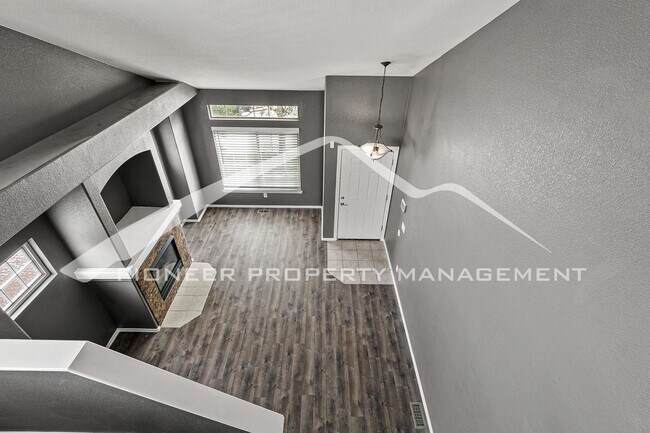 Building Photo - Spacious Home with Fenced Yard and 2 Car G...
