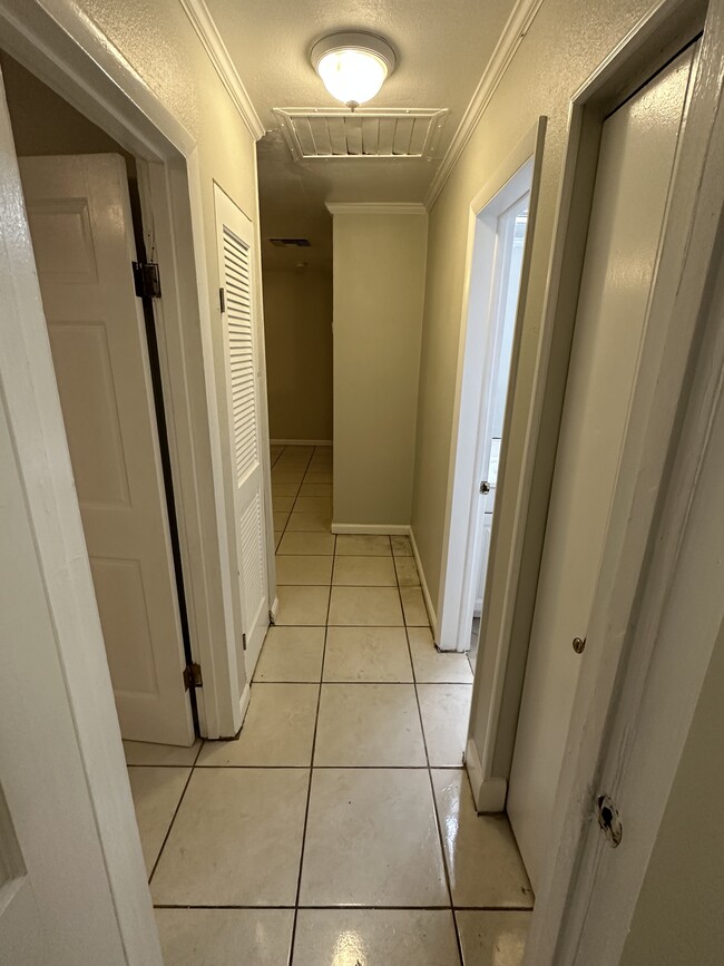 hallway to bedrooms - 7725 Cassino Ave