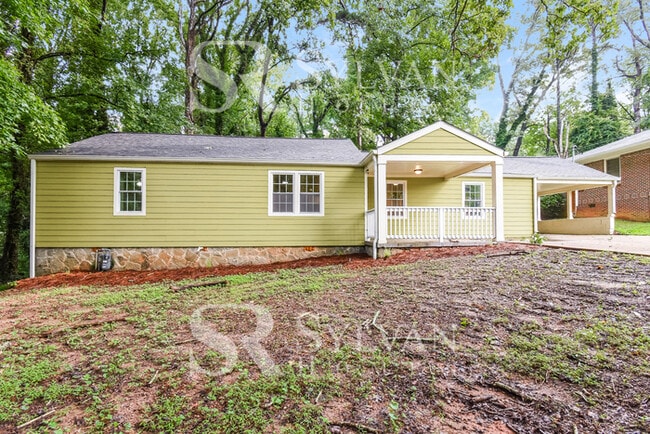 Building Photo - Beautiful 3BR 2BA home nestled in the woods