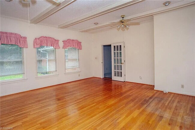Building Photo - Earn Wealth While Leasing - Like a Homeown...