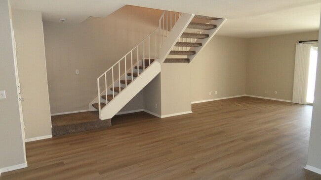 Building Photo - Two Story 4 BR 2.5 BA Condo With 2 Car Garage