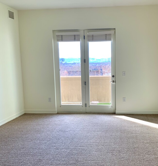 Living Room with access to Balcony - 2200 S University Blvd